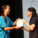yres staff giving volunteer award to volunteer